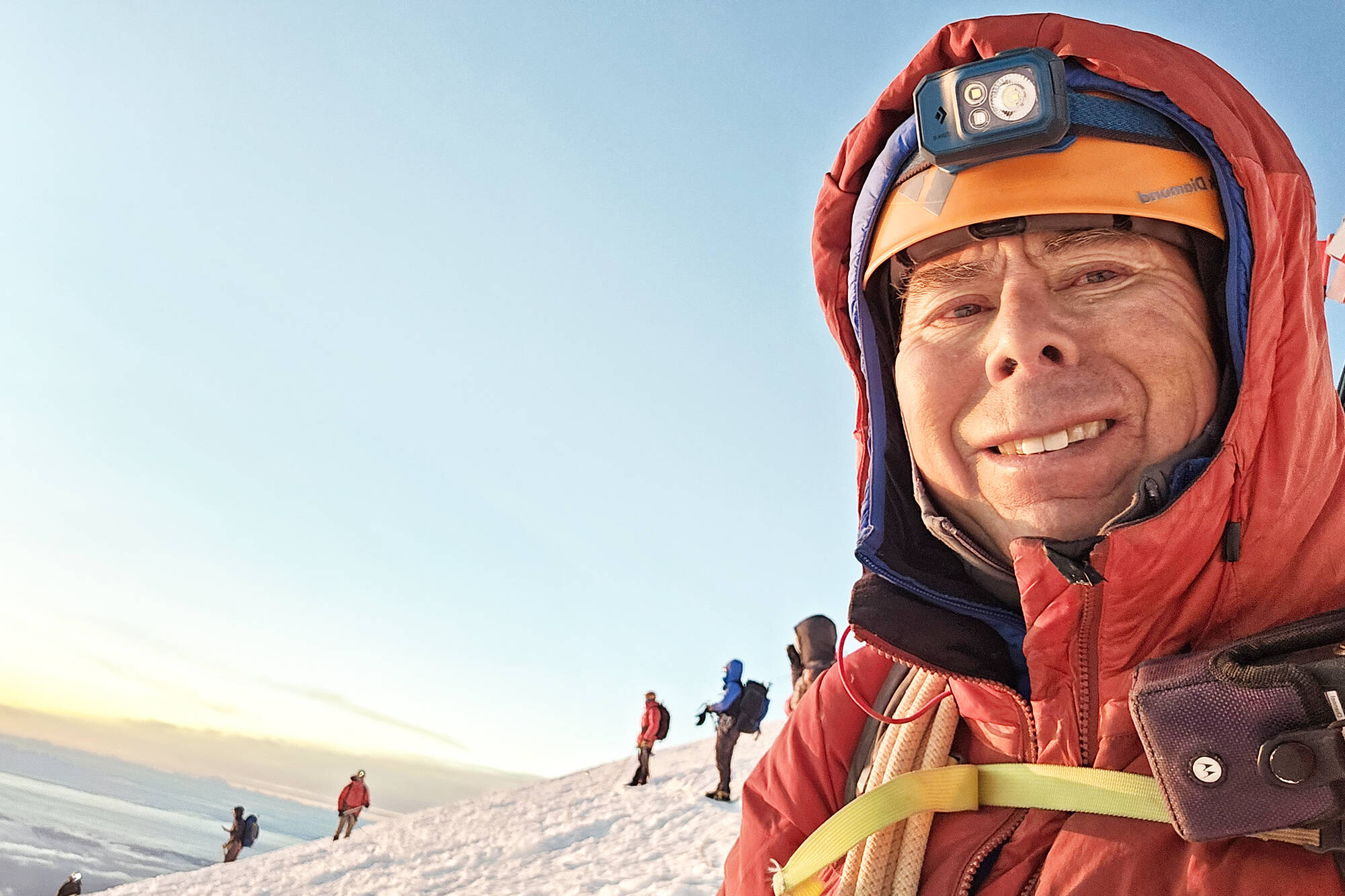 It takes Brent Okita and his fellow climbers about 12 hours hours to ascend Mount Rainier from Camp Muir. Now at the top, they've got about 10 more hours to go to reach the bottom. Photo courtesy Brent Okita