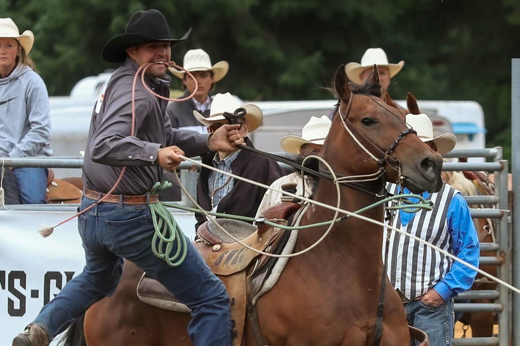 Riley Carel is an unusual rodeo competitor in that he doesnt run a farm or own a ranch. Instead, he works at Babbitt Insurance. Here he is at the Longview, WA Rodeo in late July. Photo by Elaine Kimball / Elaines Images