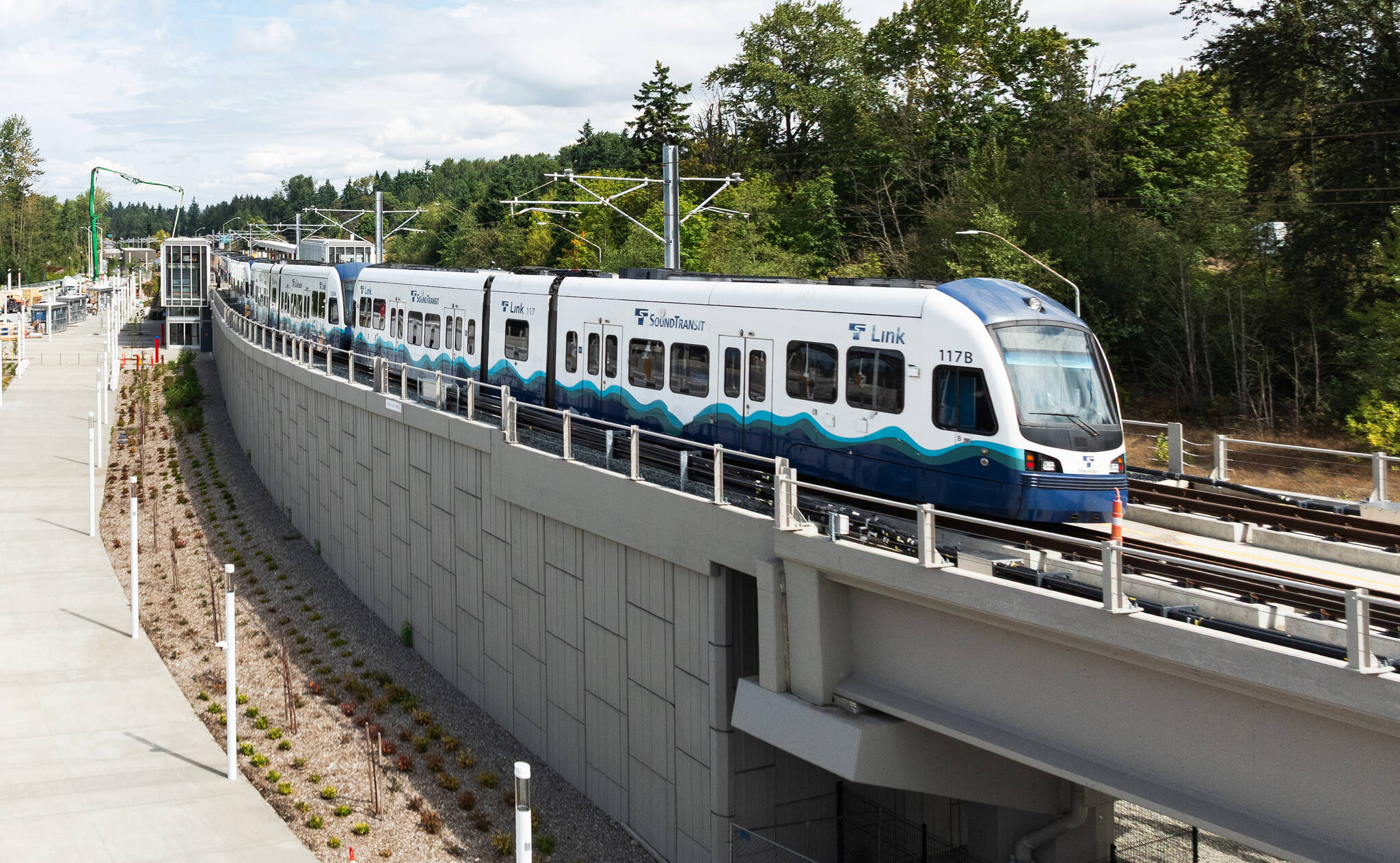 A light rail vehicle parked Aug. 18 on the alignment during the construction of the Star Lake Station in Kent. COURTESY PHOTO, Sound Transit
