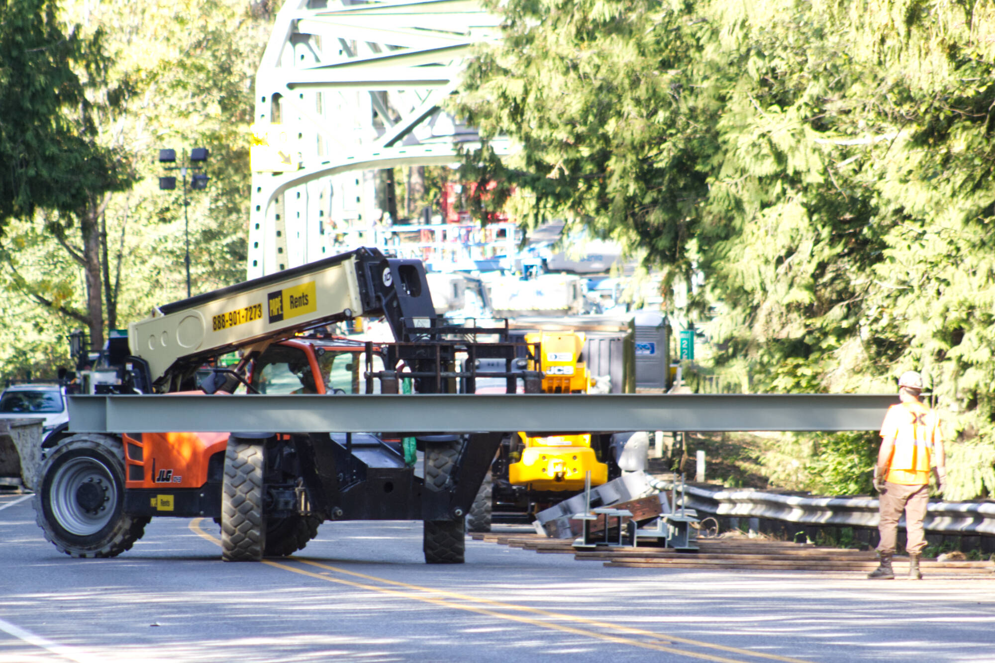 Guy F. Atkinson Construction workers moving a steel beam manufactured by Farwest Fabrication, owned by Enumclaw local Brie Crites. Photo by Ray Miller-Still