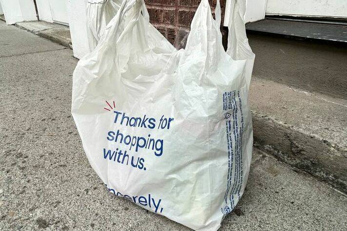 Photo by Emily Fitzgerald/Washington State Standard
A 2.25-millimeter thick reusable plastic grocery bag. Each bag is intended to last up to 125 uses.