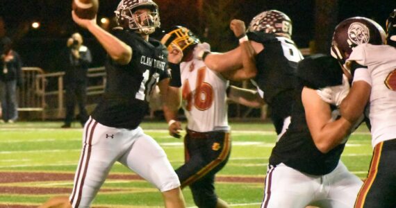 PHOTOs BY KEVIN HANSON 
With plenty of protection, Hornet senior quarterback Gavin Trachte unleashes a pass against Thomas Jefferson.