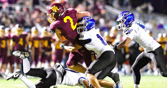 PHOTO COURTESY VINCE MILLER Kovi Poulin (2) fights his way inside the 10-yard line during White River’s victory over Federal Way.