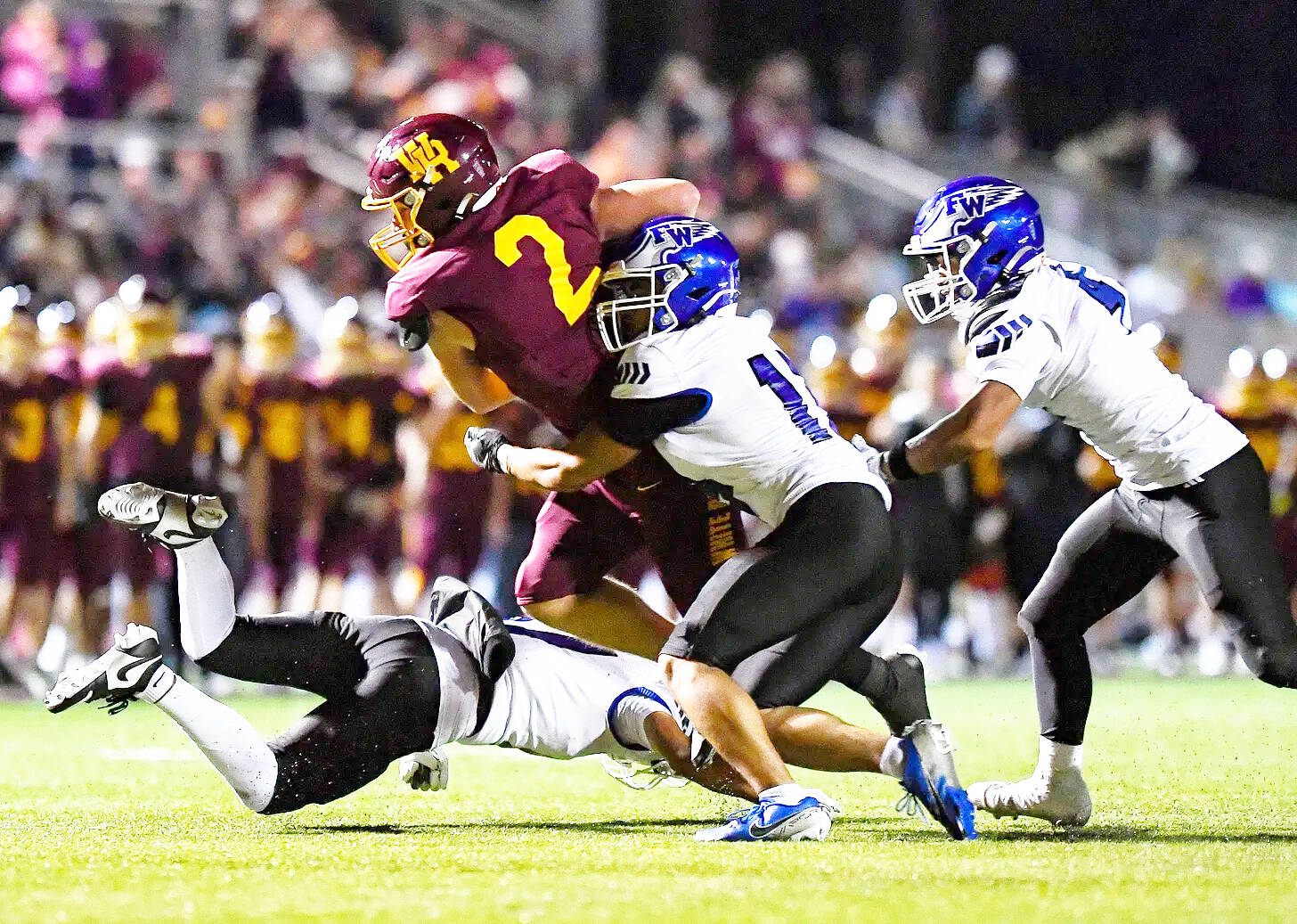 PHOTO COURTESY VINCE MILLER Kovi Poulin (2) fights his way inside the 10-yard line during White River’s victory over Federal Way.