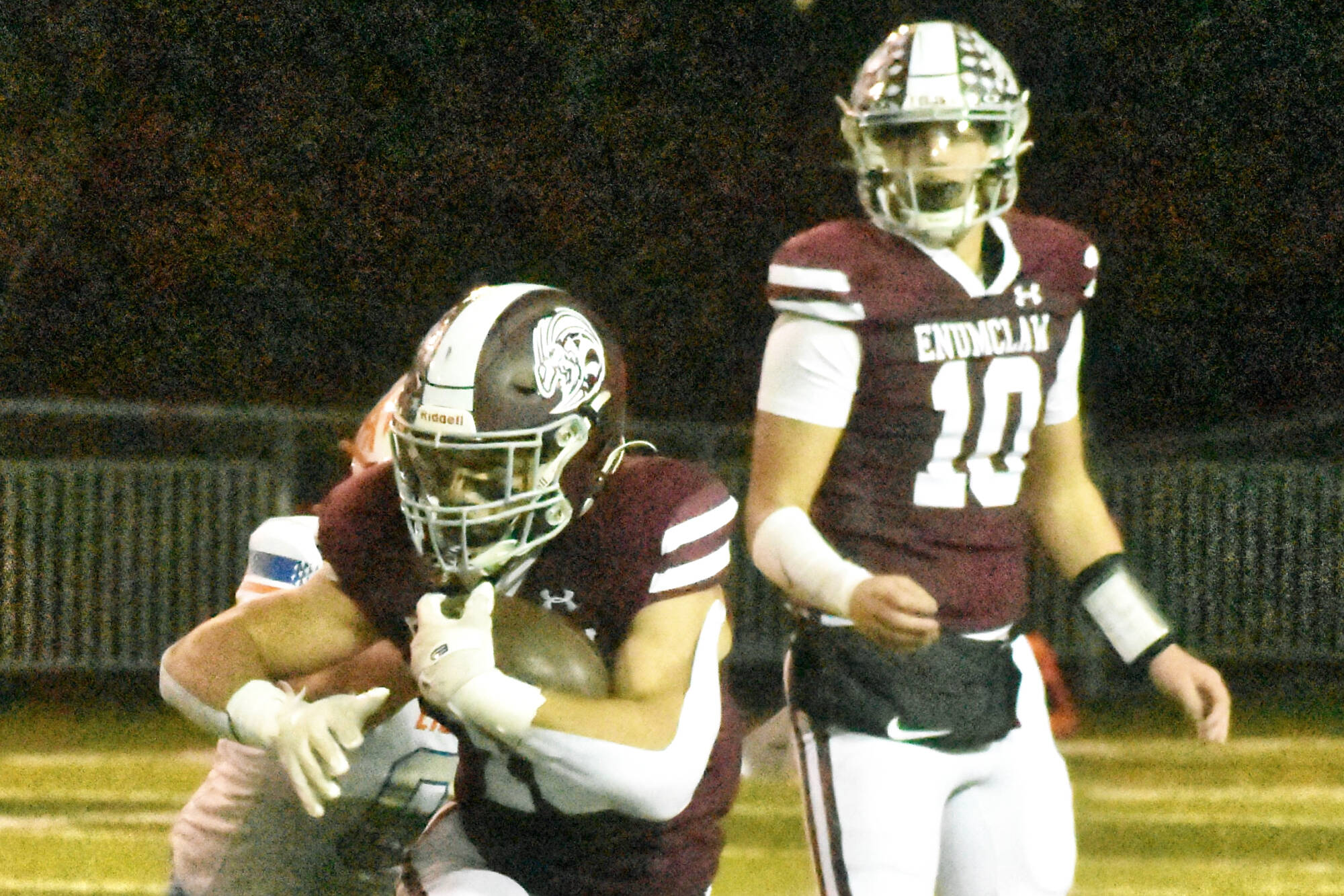 PHOTO BY KEVIN HANSON EHS running back Paxton Patterson gained some tough yardage after taking a handoff from quarterback Gavin Trachte (10) during a the game against Auburn Mountainview on Oct. 16.