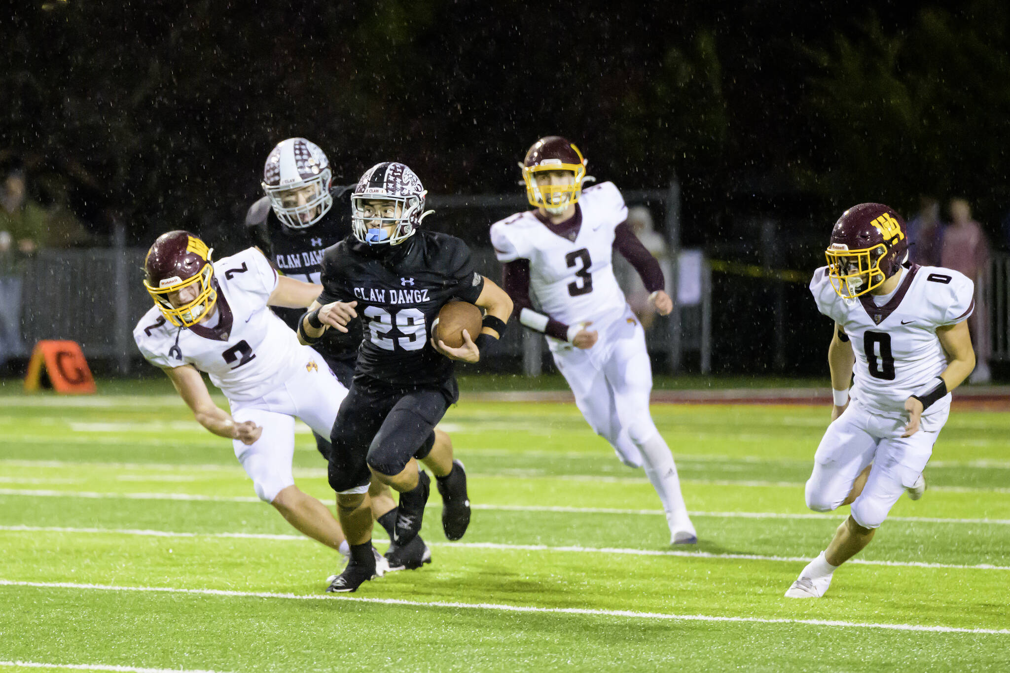 Enumclaw senior Cole Chiechi gaining some yardage before being taken down by White River.