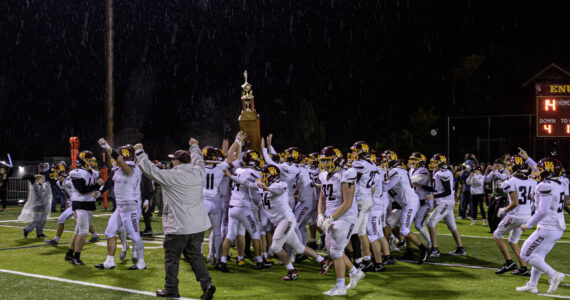 Nothing could dampen White River’s spirits after the Hornets took home last Friday the Battle of the Bridge trophy for the first time in 17 years. Photo by Vic Wright