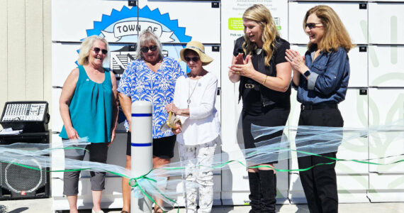 GoodRoots Northwest opened a refrigerated food locker in Carbonado in September 2024. Pictured here is Kyllonen, 90, who was the city’s longest volunteer at the local pantry. Also pictured, left to right, is Shelly Wright and Denise Vesey, co-founders of the food pantry, GoodRoots CEO Stacey Crnich, and Congressional Rep. Dr. Kim Schrier. Photo by Ray Miller-Still