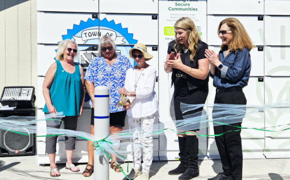 GoodRoots Northwest opened a refrigerated food locker in Carbonado in September 2024. Pictured here is Kyllonen, 90, who was the city’s longest volunteer at the local pantry. Also pictured, left to right, is Shelly Wright and Denise Vesey, co-founders of the food pantry, GoodRoots CEO Stacey Crnich, and Congressional Rep. Dr. Kim Schrier. Photo by Ray Miller-Still