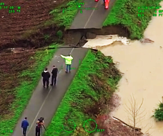 <p>A breach in the Desimone Levee along the Green River on Dec. 15 in Tukwila. SCREENSHOT/Video, Courtesy King County Sheriff&rsquo;s Office</p>