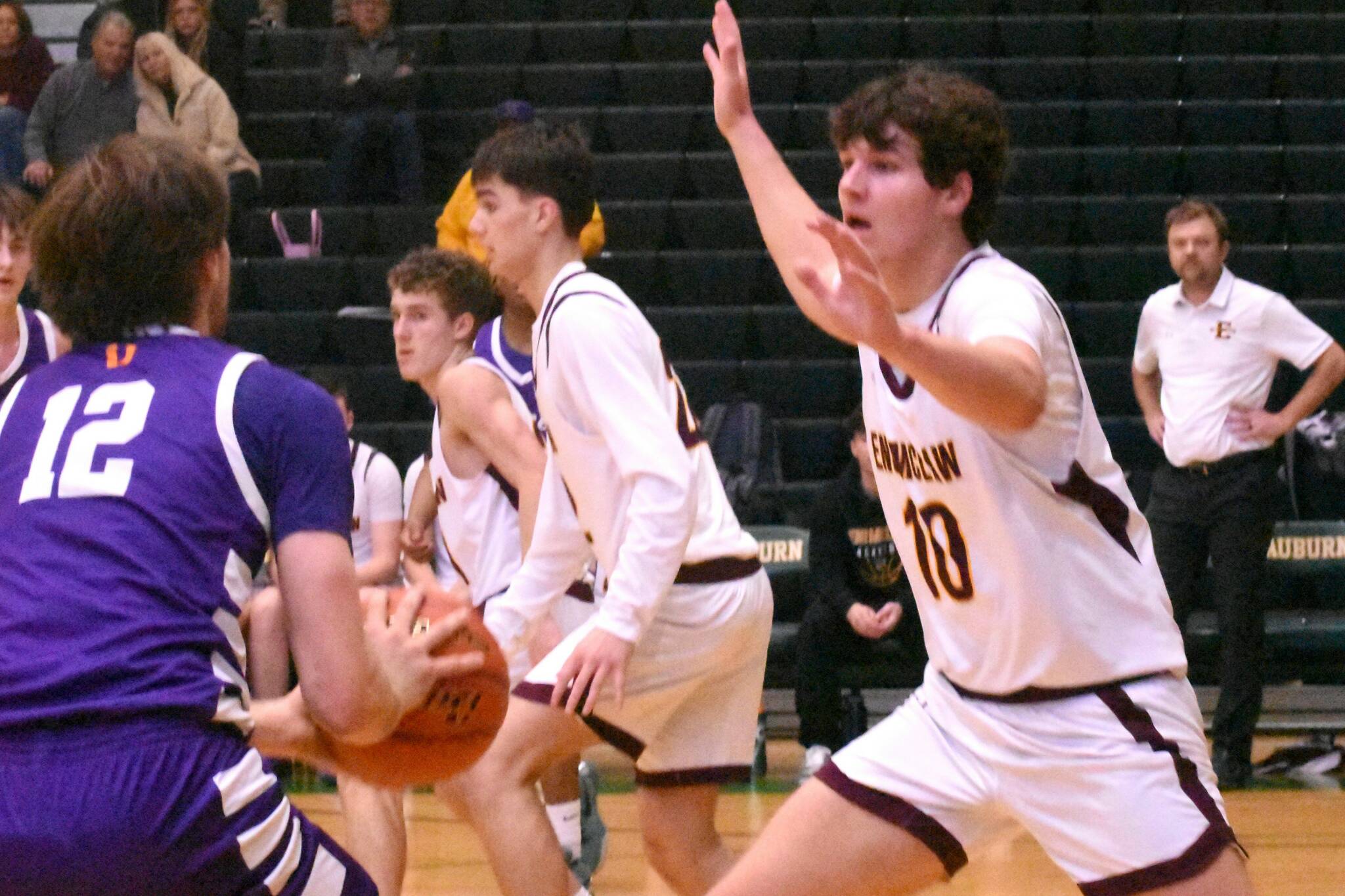 PHOTO BY KEVIN HANSON EHS senior Gavin Trachte (#10) applies some second-half defensive pressure during his teams December 13, nonleague victory over the Sumner Spartans.