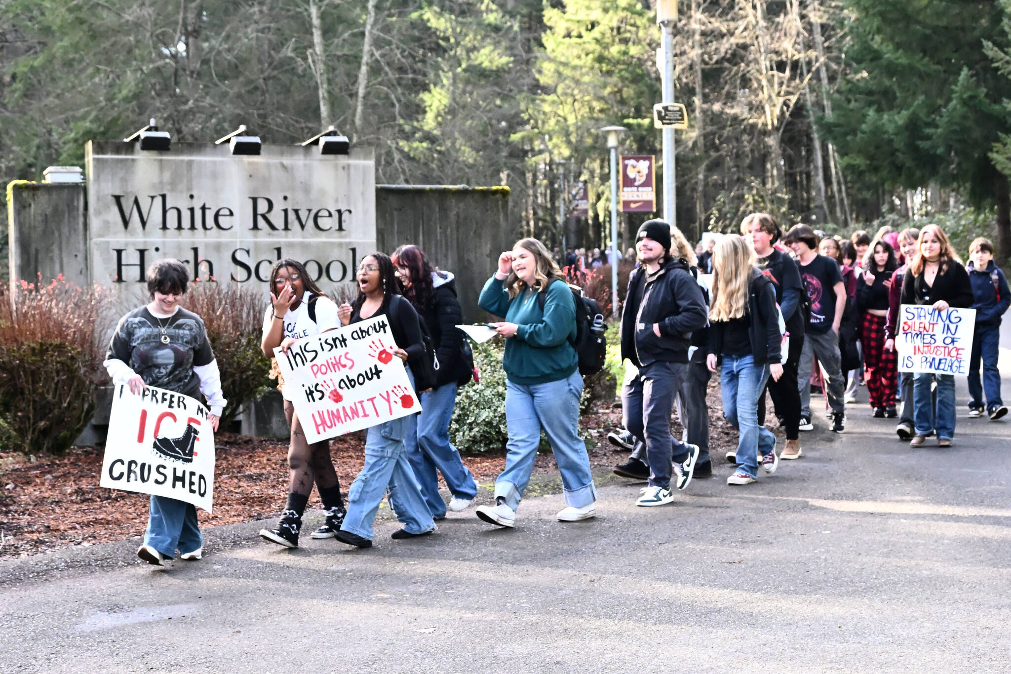 About 75 White River High students participated in the nation-wide Free America walkout on Jan. 20; the organizer was Sofia Gomez, pictured here in a green sweatshirt, fifth from the front of the group. Photo by Ray Miller-Still