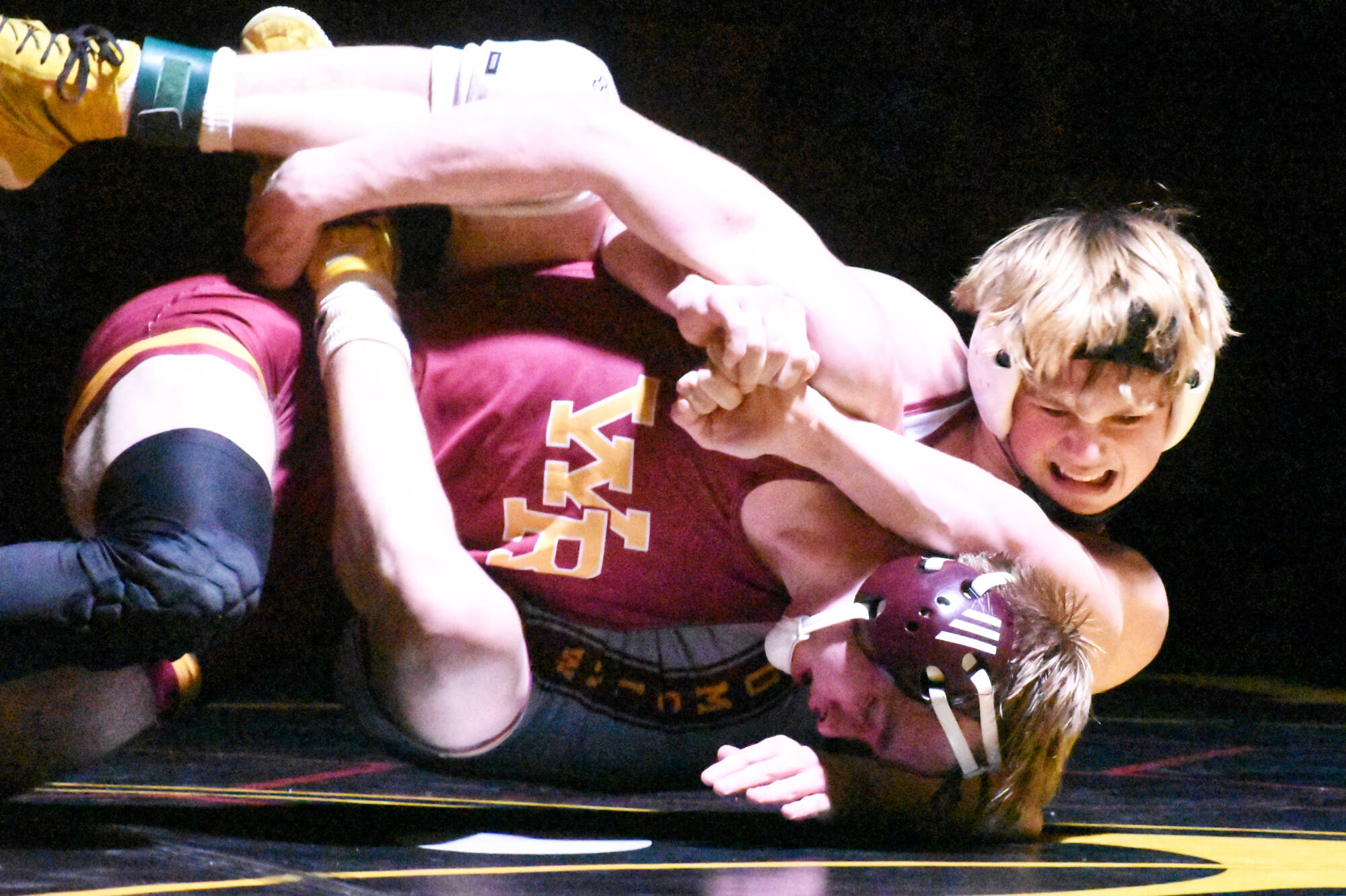 PHOTO BY KEVIN HANSON
One of Enumclaw High's victories during a dual meet with White River was delivered by Bo Bruhn, who has the advantage in this photo.