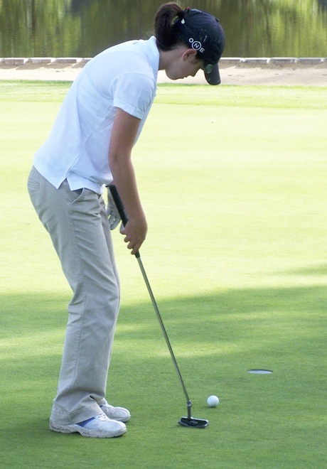 Courtney Bartlett putts on the 18th hole at High Cedars Golf Course in last week's practice match.