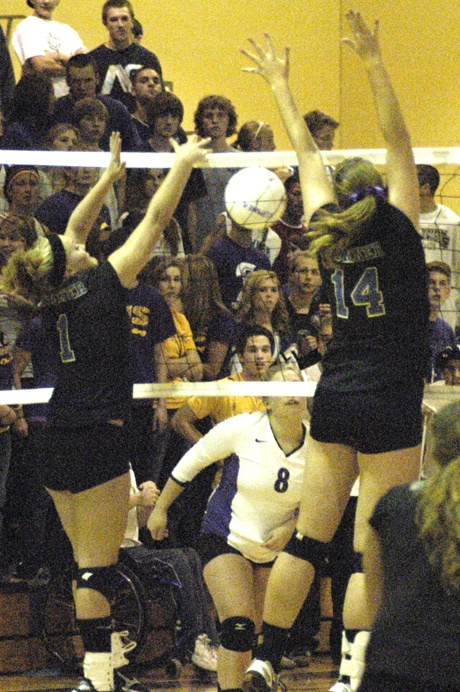 Sumner's Katee Hines and Kayla Roberts combine for a blocked shot against North Thurston Sept. 8 at home.