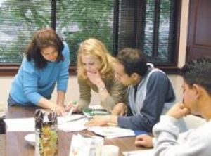 Learning and teaching language hand in hand