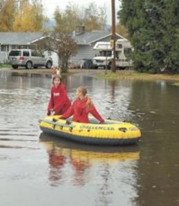 Buckets of rain swell rivers, bring floods