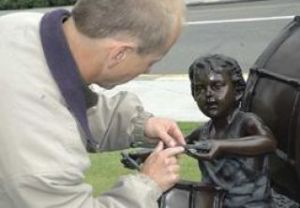 City art prompts questions; piece will go if counterfeit