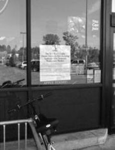 Signs advertising for temporary workers showed up in Plateau stores April 23. Photo by Teresa Herriman