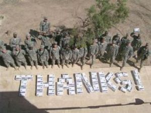 Area Scouts deliver care packages to soldiers