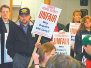 Union members protest contract, question levy