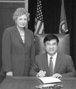 Gov. Gary Locke signs the child fatality bill