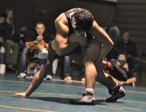 Kioni Gill took the 180 pound division beating Luke Holsinger from Peninsula 6-0.