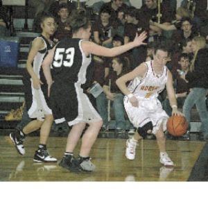 White River junior Carly McCutchen drives the baseline during Friday night’s home-court victory over Bonney Lake.