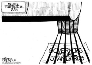 This weeks editorial cartoon depicts the senate transportation plan running over the Governor's fuel standards.