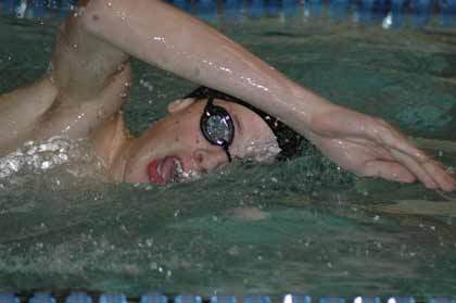 Zane Gustafson raced to a district-qualifying time in the 500-yard freestyle.