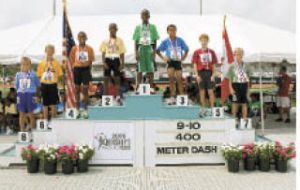 Mason White of Bonney Lake took his place on the podium after a  third-place finish.