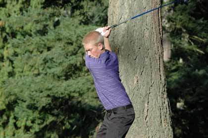 Sumner High sophomore Brandon Barlow takes a swing at par in action at Enumclaw Oct. 6.