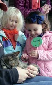 Elizabeth and Avery from the Covington Co-op Preschool take a field trip to Thomasson Farms in Enumclaw. They were accompanied by students of the Sumner co-op preschool on their own field trip to pet the farm animals