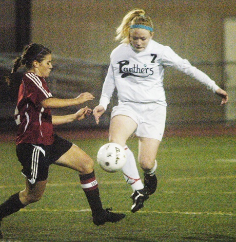 Bonney Lake defender Tesla Pappas battles a Camas player for the ball.