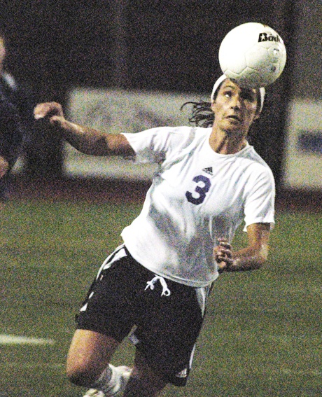 Sumner's Kaylee Holloway delivers a header during Nov. 10 first-round game of the Class 3A state tournament.