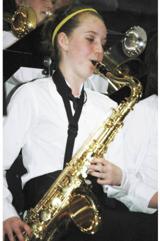 A Lakeridge  Middle School student plays her saxaphone during Saturday’s Hawkshun fundraiser at Lakeridge Middle School in Bonney Lake.