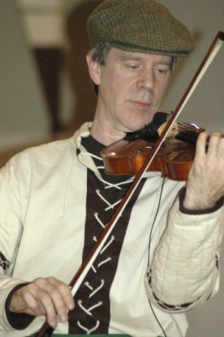 Internationally-acclaimed Celtic violinist Jamie Laval performed Thursday night in the Enumclaw High School gymnasium as part of a fundraiser for the Enumclaw School District's music education programs.