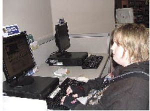 Blaine Westby gets free online help with a linear equation Wednesday at the Sumner library.