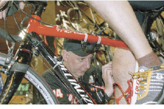 One of the most important aspects of riding is the angle of the knees during full extension. Jim Stevenson measures Buckley resident Al Knopik’s extension.