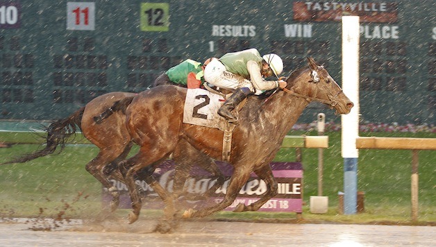 Strategic Patience and jockey Debbie Hoonan edge Clemens Brook in the feature race for fillies and mares at Emerald Downs on Memorial Day. 88-year-old Don Munger is the winning owner
