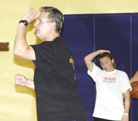 Sumner High girls basketball head coach Robert Thayer points out instructions during a Nov. 18 practice. The Spartans open the season Dec. 2 at Class 4A Spanaway Lake.