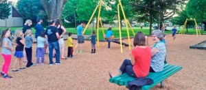 Sumner kids and adults alike line up to try out the new zip line at Loyalty Park.