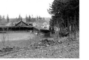 Newcomers may not have noticed there is a baseball diamond tucked between the Enumclaw Expo Center fieldhouse and the football field. And only those who have been around a few years will recall the days when the diamond was enclosed by bleachers