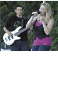 A group dances to the live music of Idol Eyez during the Tunes@Tapps series July 22 at Allan Yorke Park in Bonney Lake.