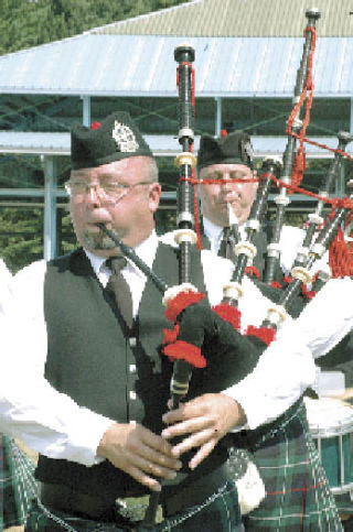 Sunny skies greeted the Scottish Highland Games and Clan Gathering Saturday and Sunday at the Enumclaw Expo Center and so did the large crowds that always turn out for the event. Above