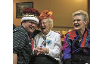 Students from White River High School visited Living Court in Enumclaw Nov. 6 as part of the Buddy Up program. White River Homecoming Duke Max Davis crowned Harvest Ball Queen Glee McCauley and Homecoming Queen Ashley Stevens crowned Harvest Ball King Jim McElroy. Students and residents danced the night away.