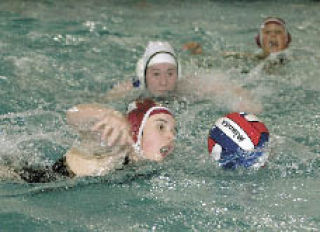EHS’ Åli Ballard sprints down the pool Friday during play with Bonney Lake.