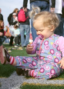 Olivia Hansen has a successful Easter egg hunt at the Sunset Stadium in Sumner