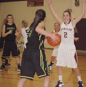 Enumclaw High’s Morgan Tinney applies defensive pressure during the Hornets’ Thursday night