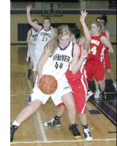 Ashley Delany blocks out a Franklin Pierce defender during play Friday.